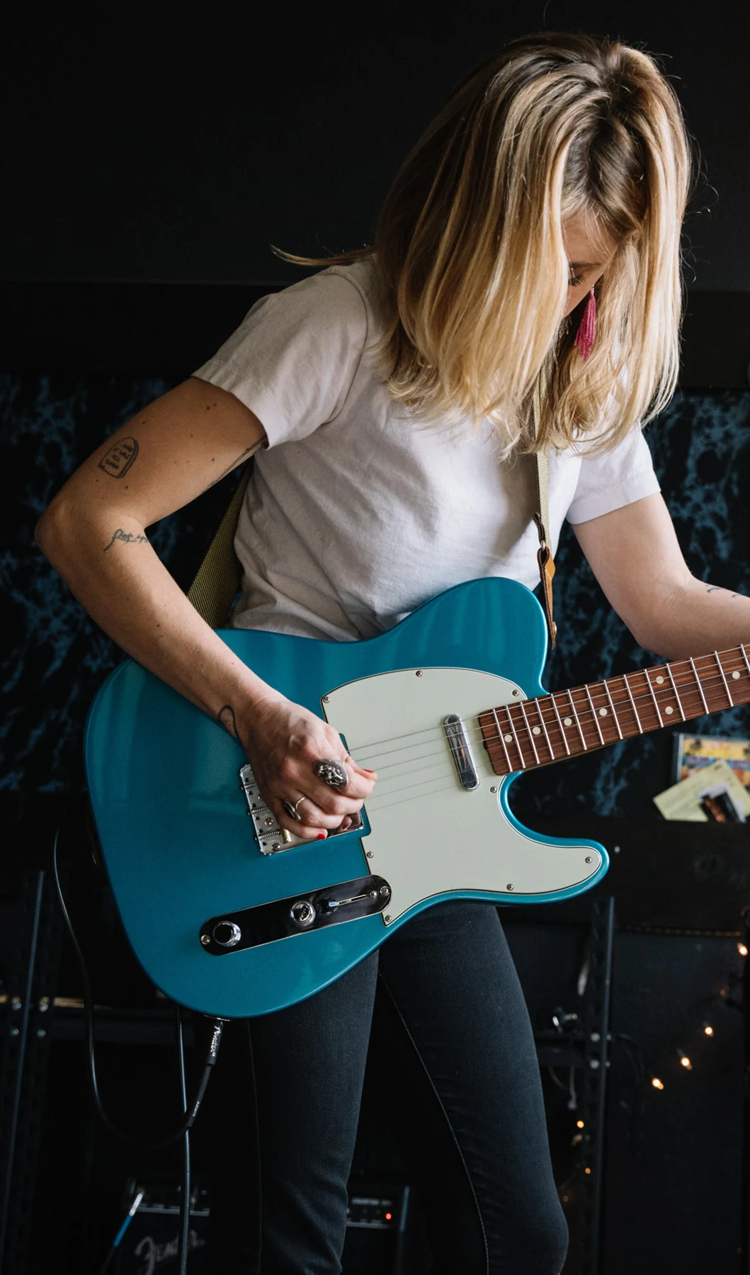 Fender — musician with an electric guitar